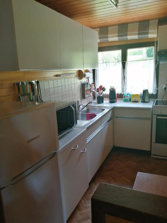 Kuchyň nebo kuchyňský kout v ubytování Chalet 94 la boverie
