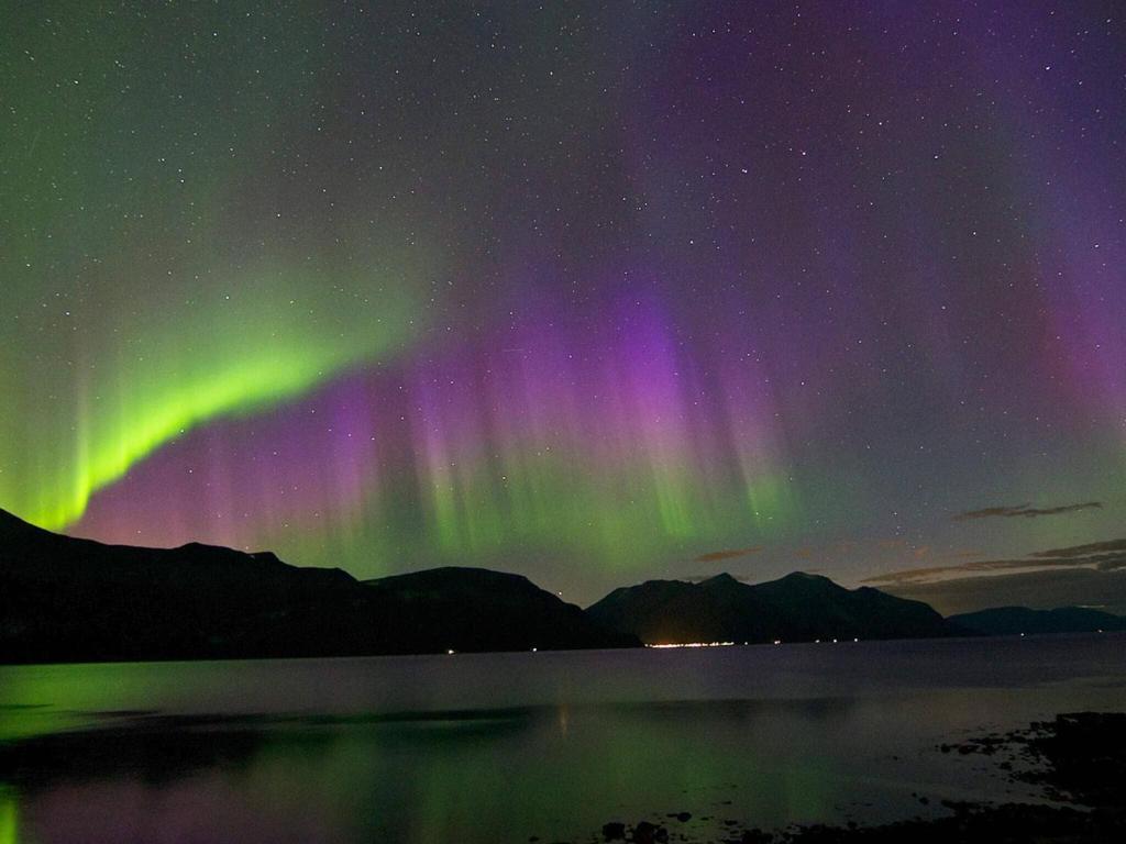 una imagen de la aurora boreal en el cielo en 6 person holiday home in Finnsnes-By Traum, en Finnsnes
