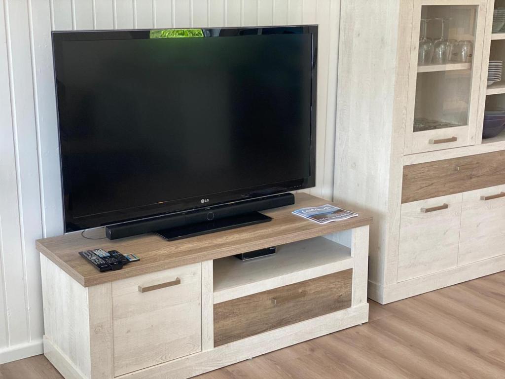 TV a/nebo společenská místnost v ubytování Haus der Träume