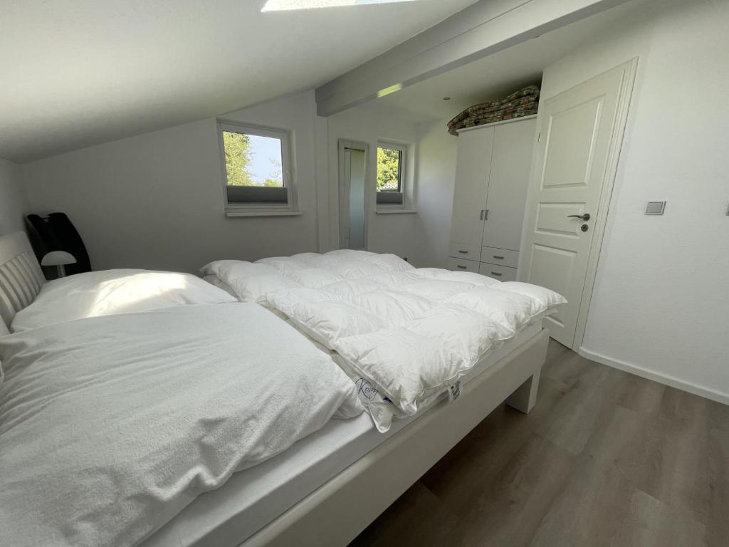 Postel nebo postele na pokoji v ubytování Haus der Träume