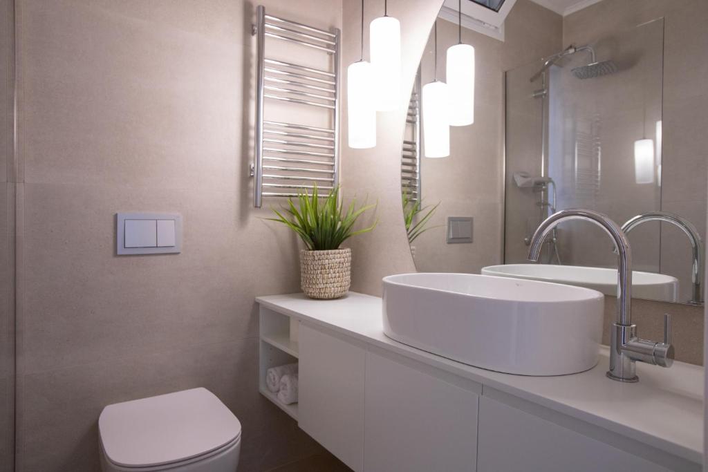 Koupelna v ubytování Frosini Seafront Loft