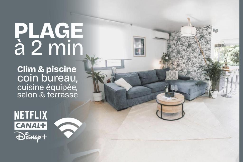 un soggiorno con divano e tavolo di T3- un Oasis rénové et climatisé au centre de LGM a La Grande-Motte