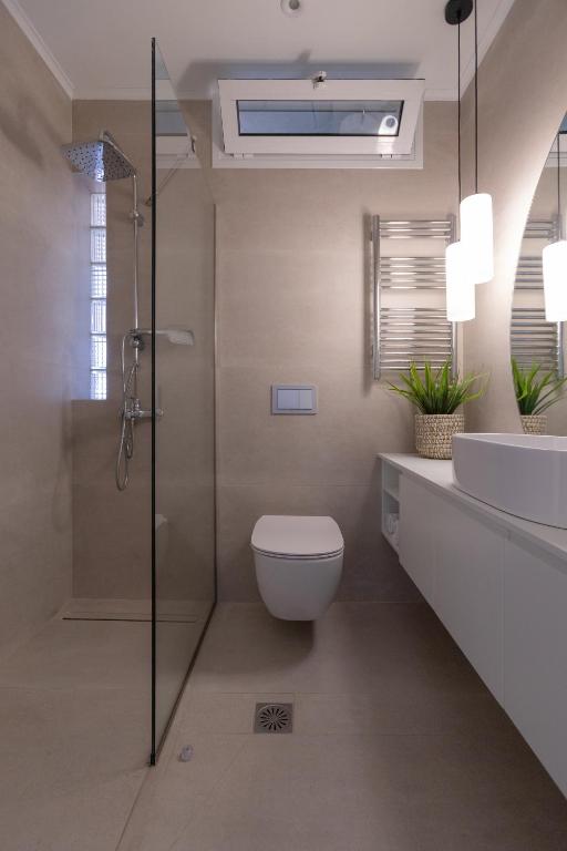 Koupelna v ubytování Frosini Seafront Loft