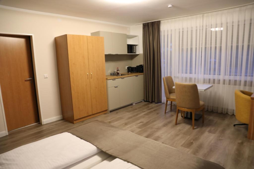 Kuchyň nebo kuchyňský kout v ubytování Hotel Schlangenbader Hof