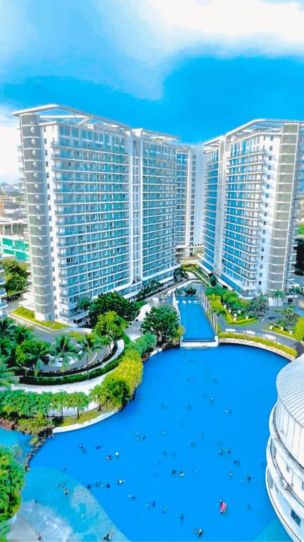 Bazén v ubytování Azure Urban Beach Resort Residences nebo v jeho okolí