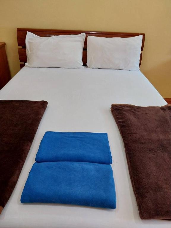 Postel nebo postele na pokoji v ubytování Phi Phi Sand Sea View Resort