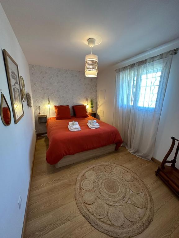 Een bed of bedden in een kamer bij Villa Paula