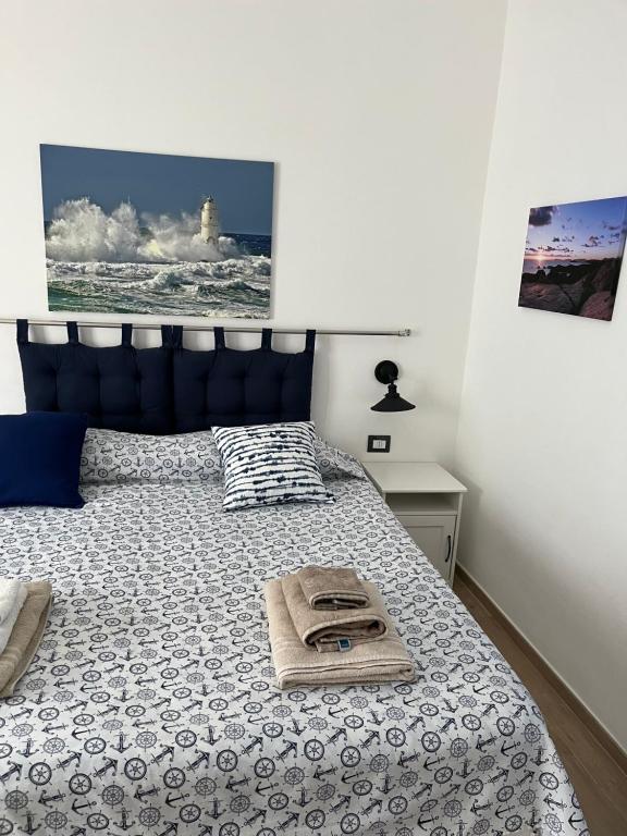 Postel nebo postele na pokoji v ubytování ittiturismo S.Croce