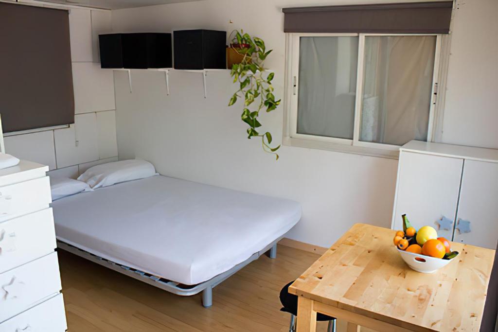Posteľ alebo postele v izbe v ubytovaní Arc de Bará Camping & Bungalows