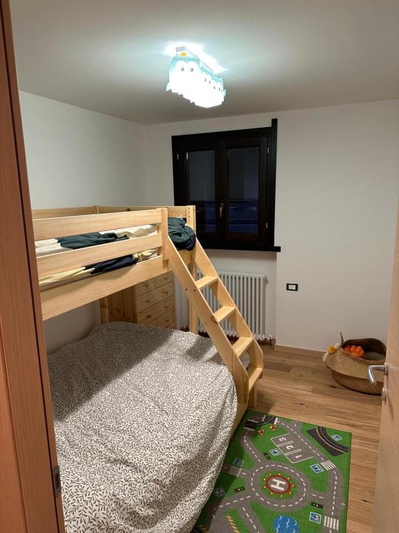 Postel nebo postele na pokoji v ubytování SnowLodge Valmalenco