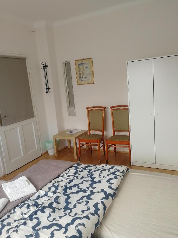 Postel nebo postele na pokoji v ubytování Zsuzsanna Vendégház