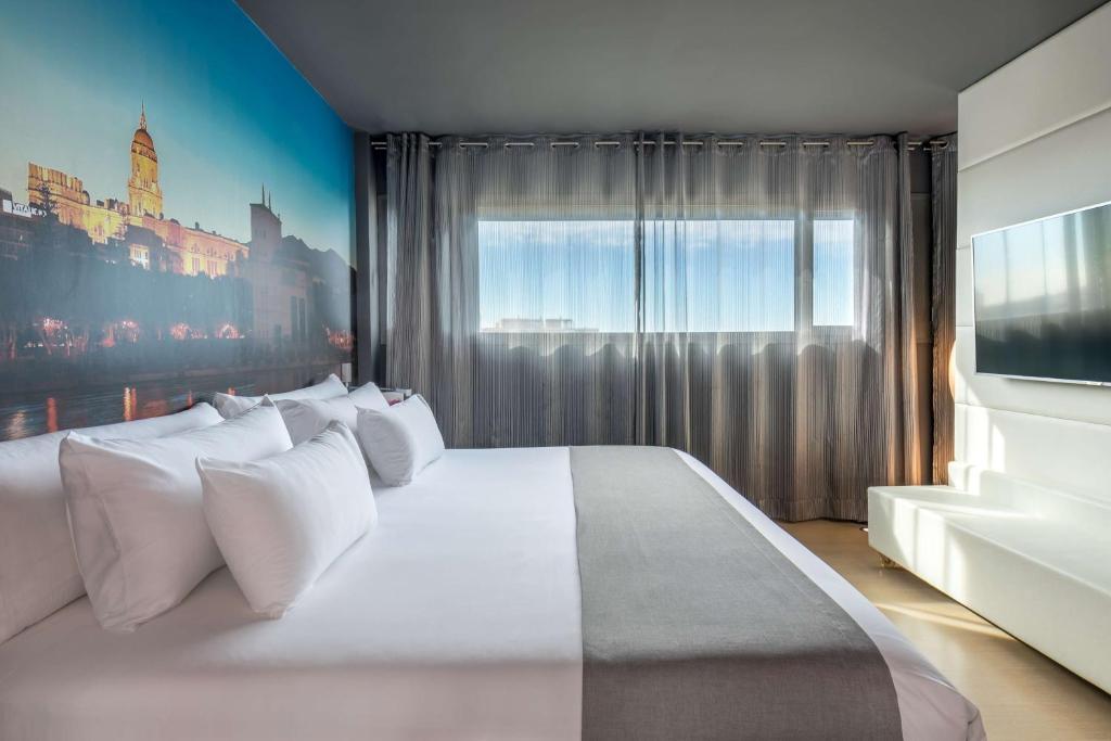 Posteľ alebo postele v izbe v ubytovaní Barceló Malaga