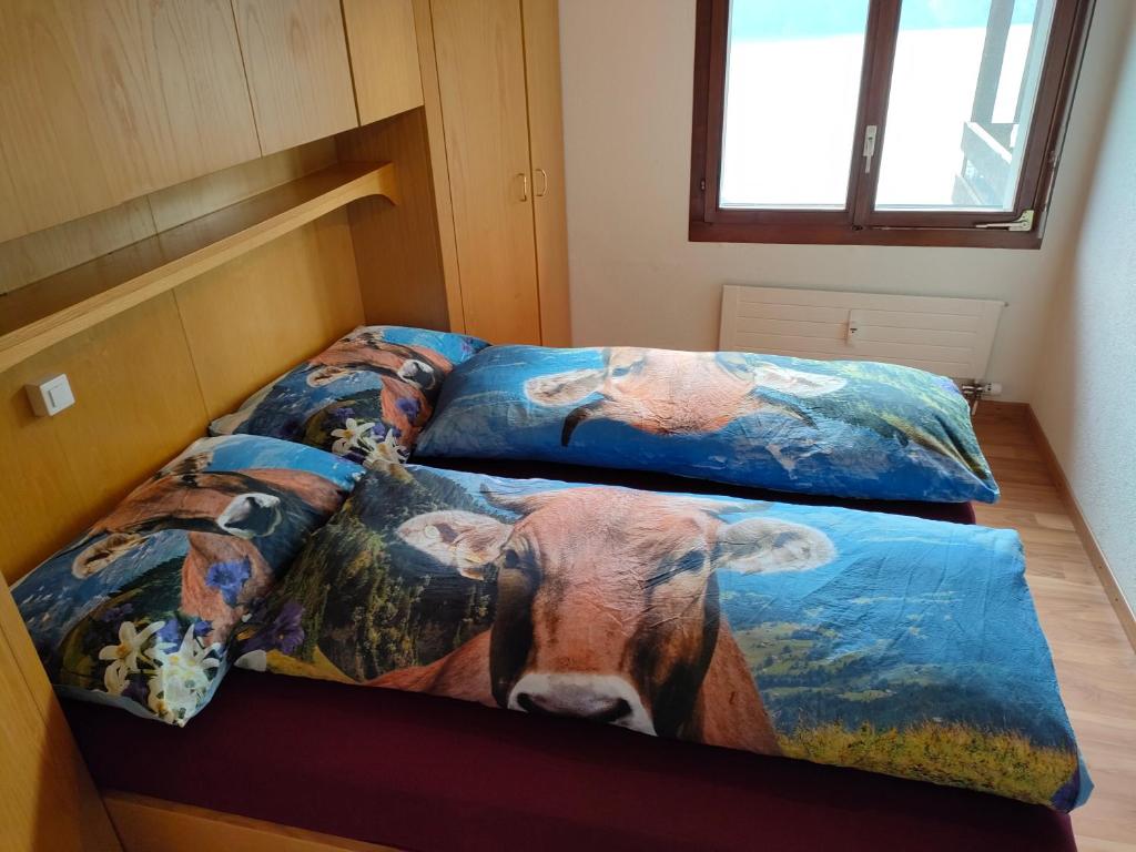 Postel nebo postele na pokoji v ubytování Camenzind