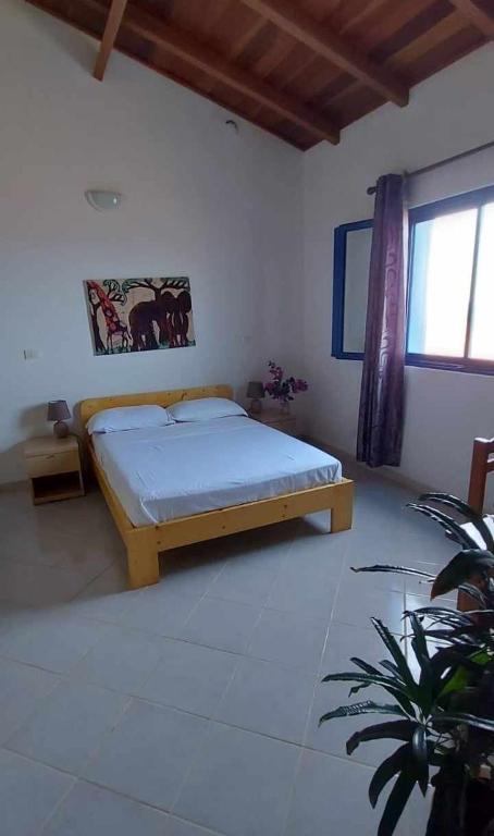 Postel nebo postele na pokoji v ubytování Casa Torre