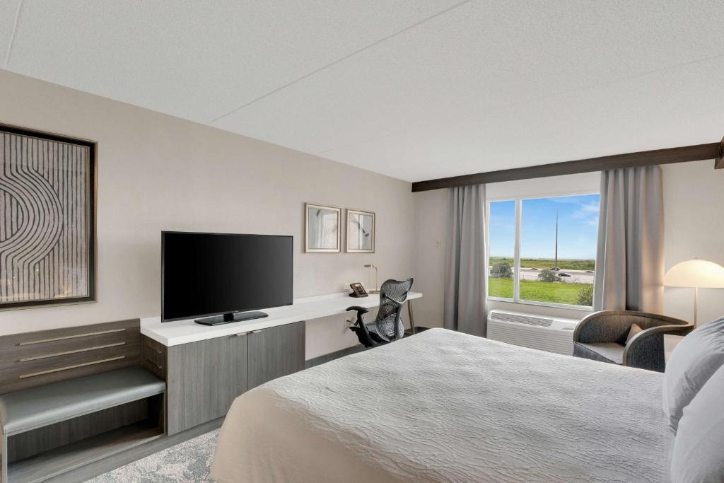 TV a/nebo společenská místnost v ubytování Hilton Garden Inn Toronto/Brampton