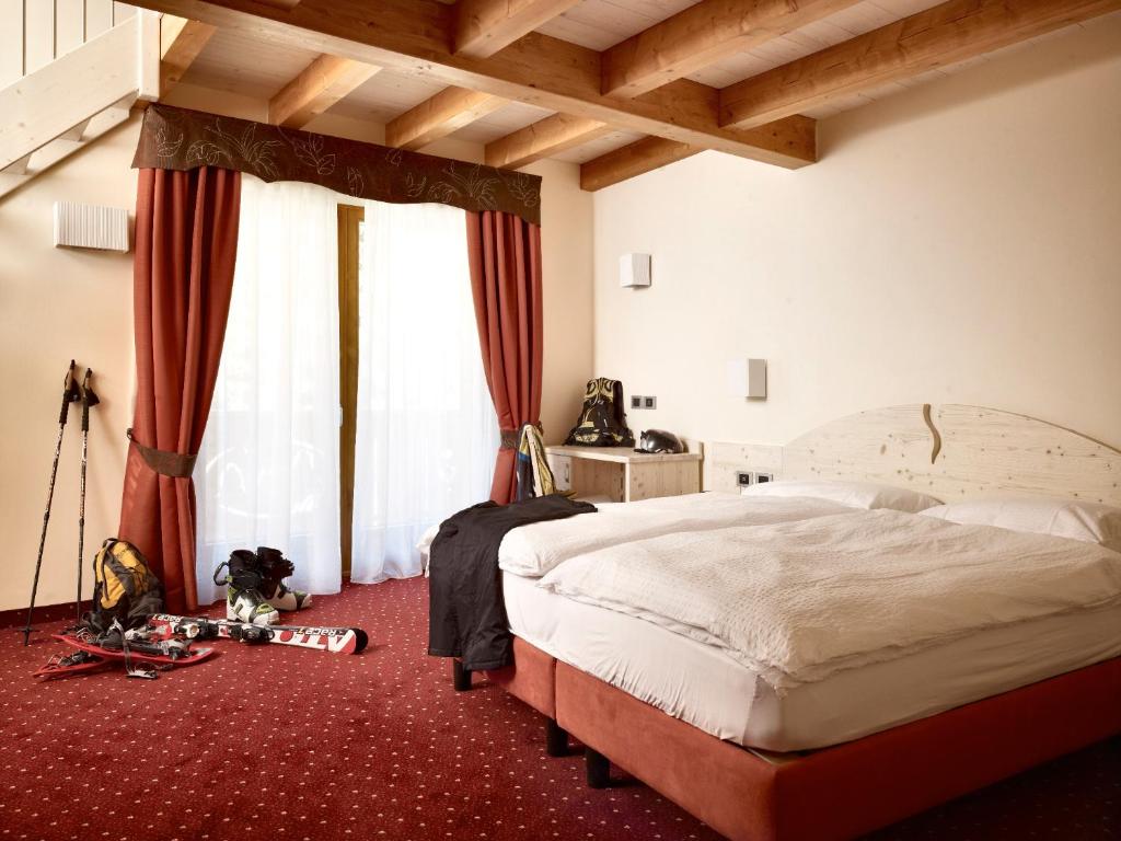Postel nebo postele na pokoji v ubytování Panorama Hotel Fontanella