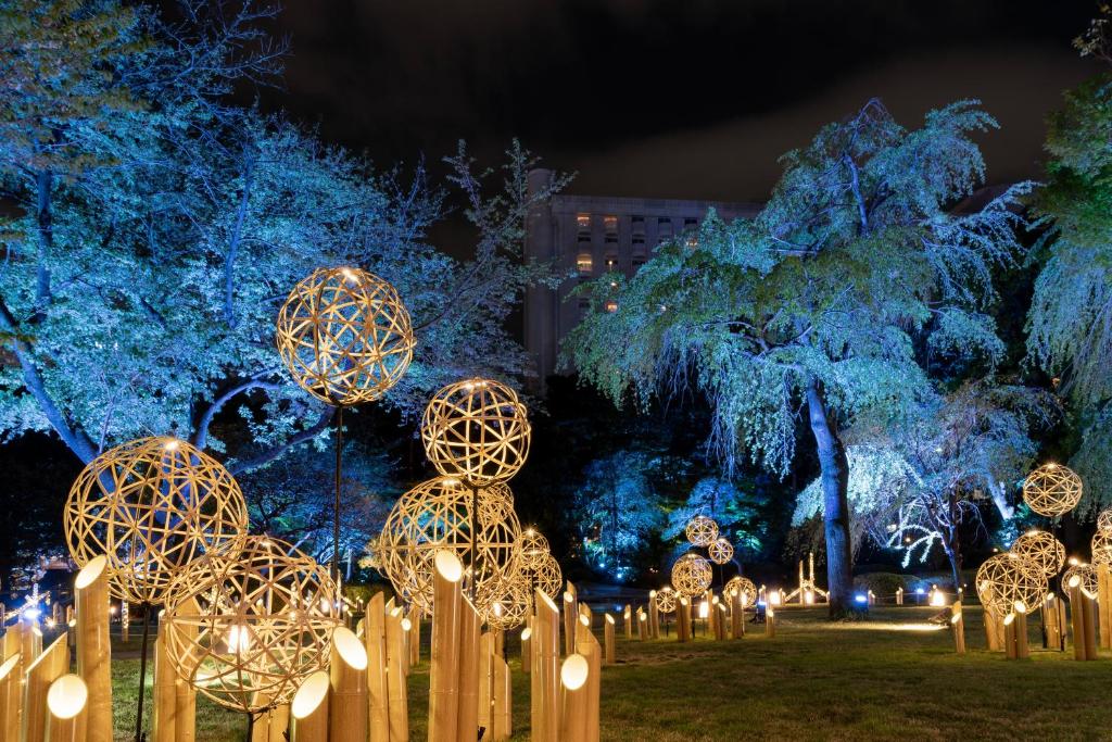 a display of lights in a park at night at Grand Prince Hotel Shin Takanawa in Tokyo