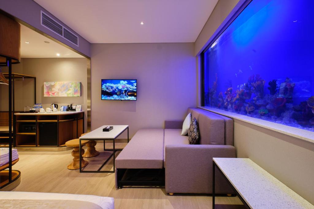 TV a/nebo společenská místnost v ubytování Hotel H2O