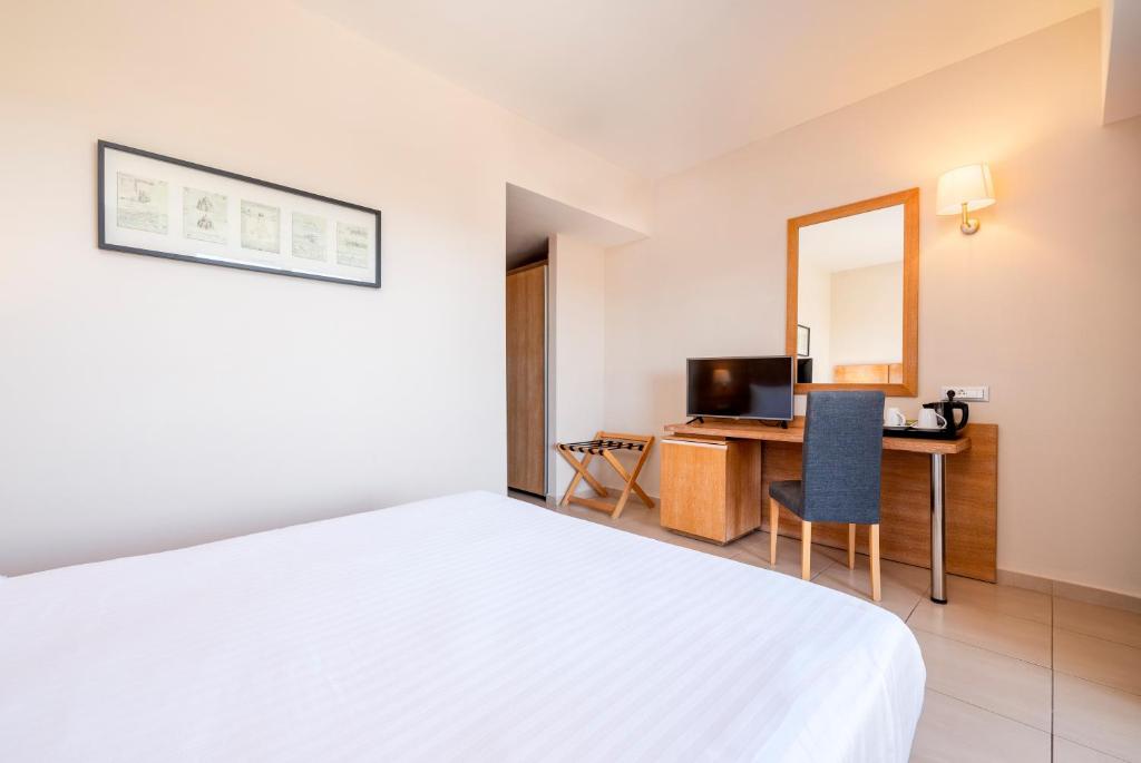 Postel nebo postele na pokoji v ubytování D'Andrea Mare Hotel