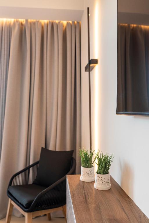TV a/nebo společenská místnost v ubytování D'Andrea Mare Hotel