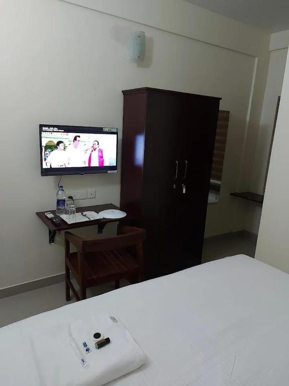 TV a/nebo společenská místnost v ubytování Masterkey Deluxe Rooms