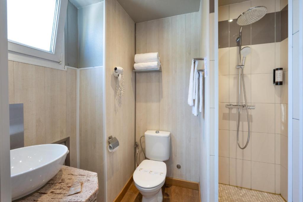 Koupelna v ubytování Hotel Beau Rivage