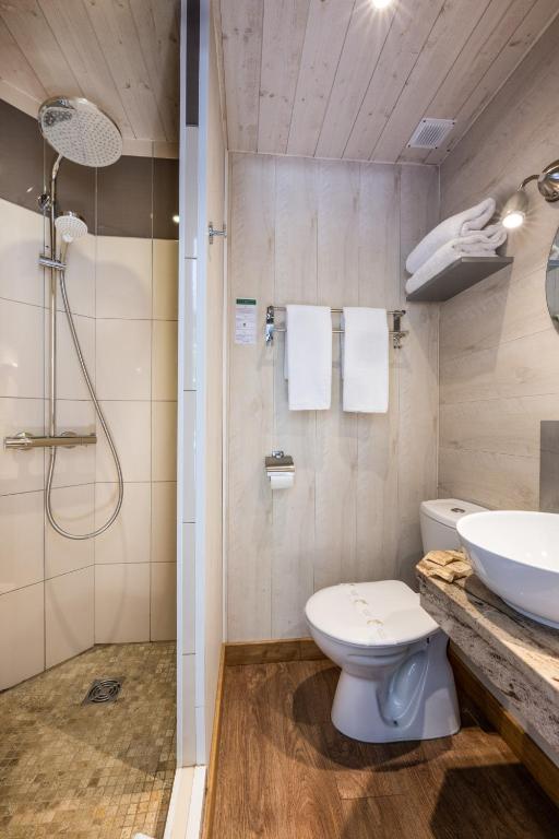Koupelna v ubytování Hotel Beau Rivage