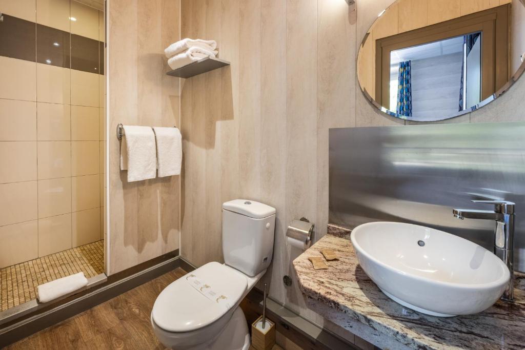 Koupelna v ubytování Hotel Beau Rivage