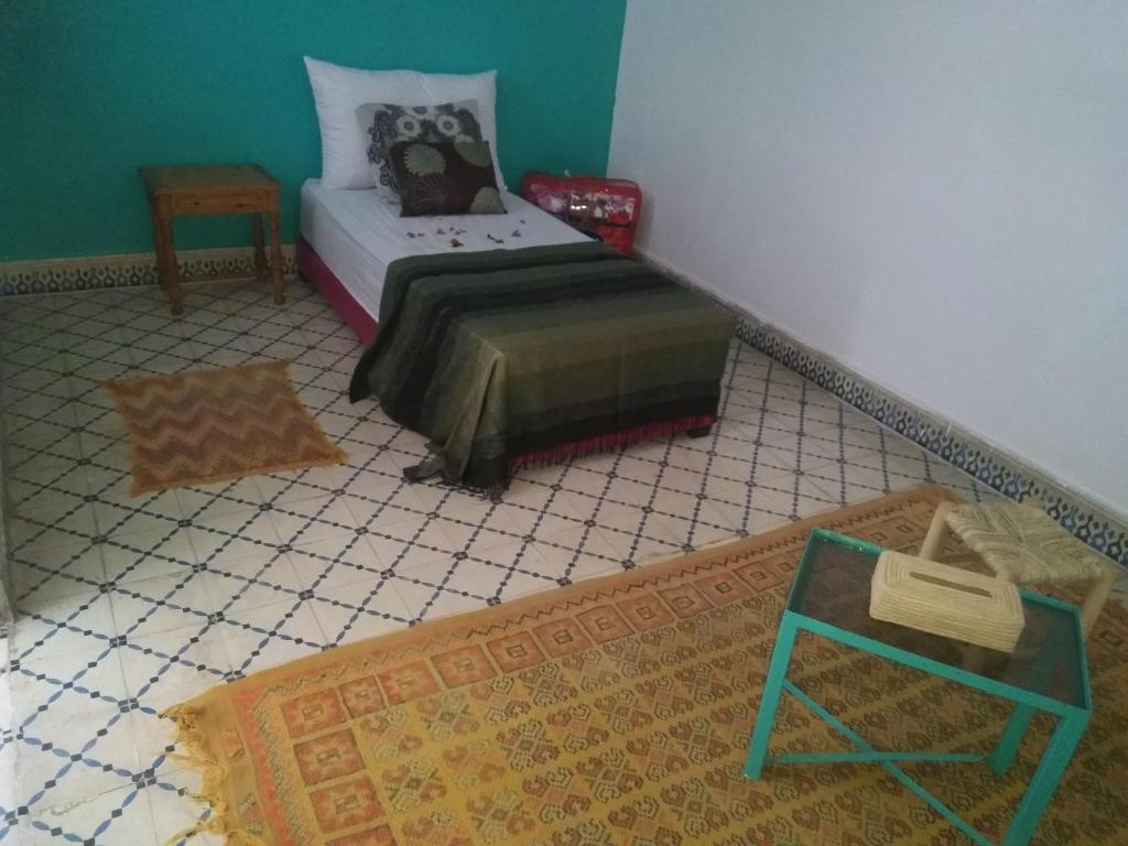Postel nebo postele na pokoji v ubytování marrakesh riad