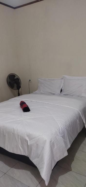 Postel nebo postele na pokoji v ubytování Selow Homestay