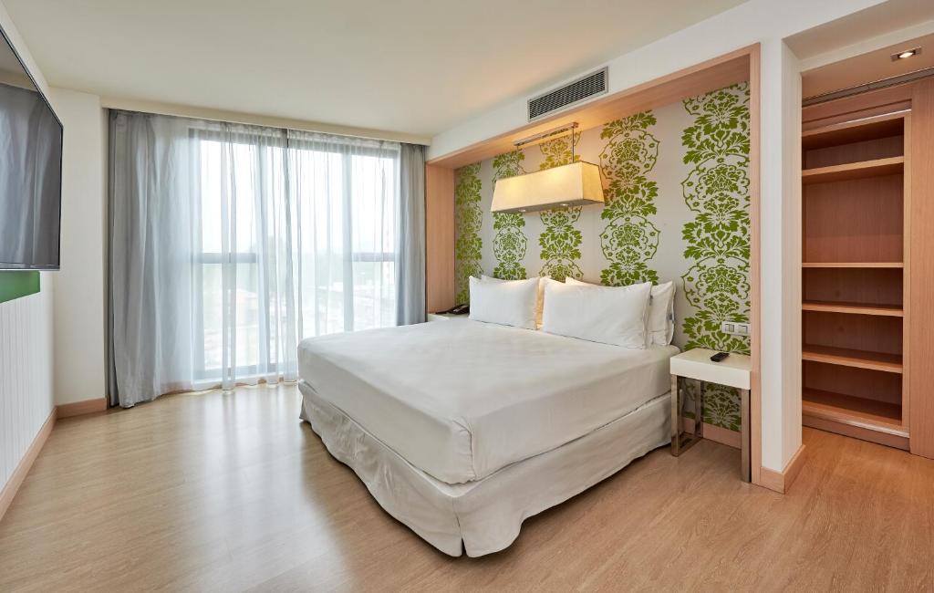 Postel nebo postele na pokoji v ubytování DoubleTree by Hilton Girona
