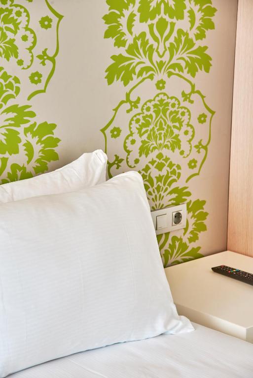 Postel nebo postele na pokoji v ubytování DoubleTree by Hilton Girona