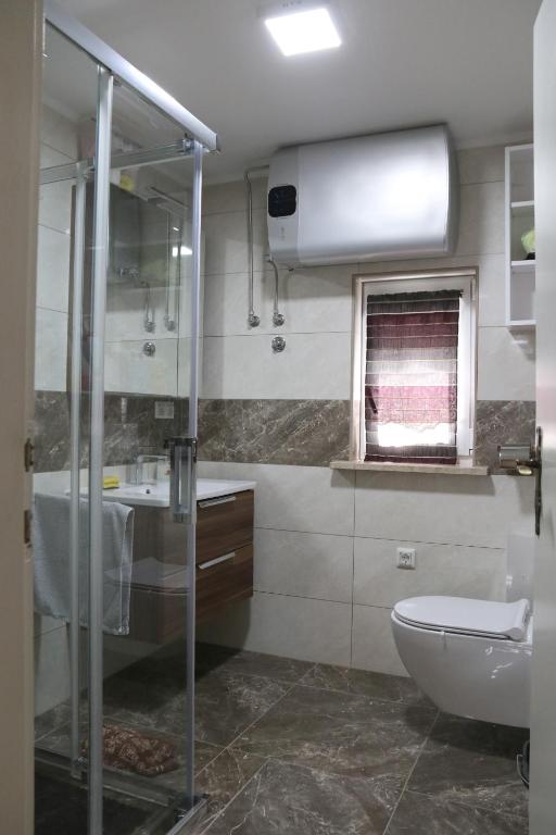 Koupelna v ubytování Vila Tamaškut