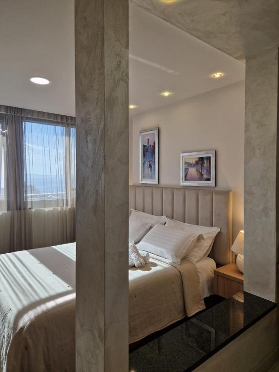 Posteľ alebo postele v izbe v ubytovaní Island View Apartment