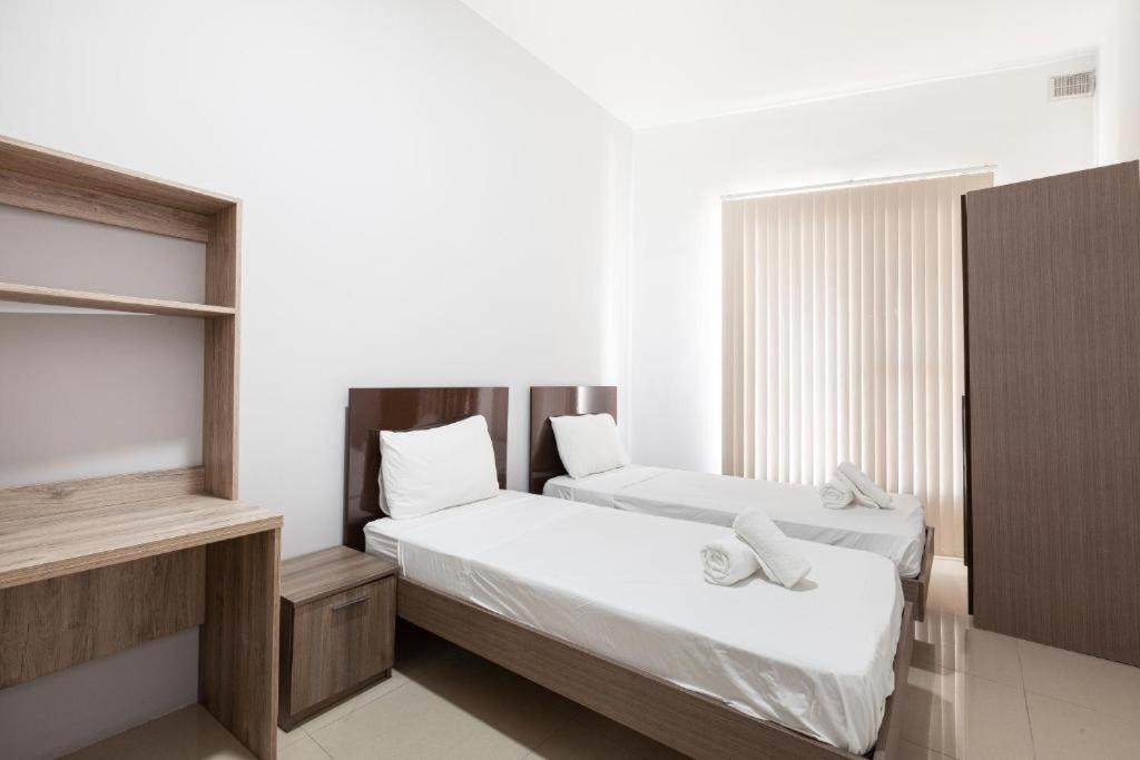 Postel nebo postele na pokoji v ubytování Stylish & Super Central 2BR apartment by 360 Estates