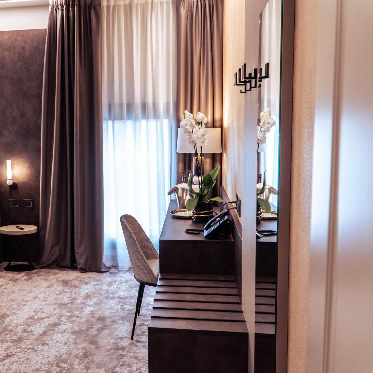 Posezení v ubytování Hotel De Amicis