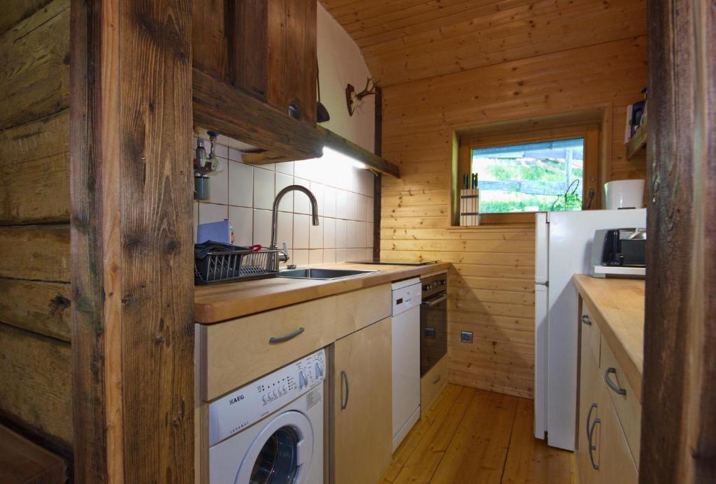 Kuchyň nebo kuchyňský kout v ubytování Falkert-Hütte „Beim Almöhi"