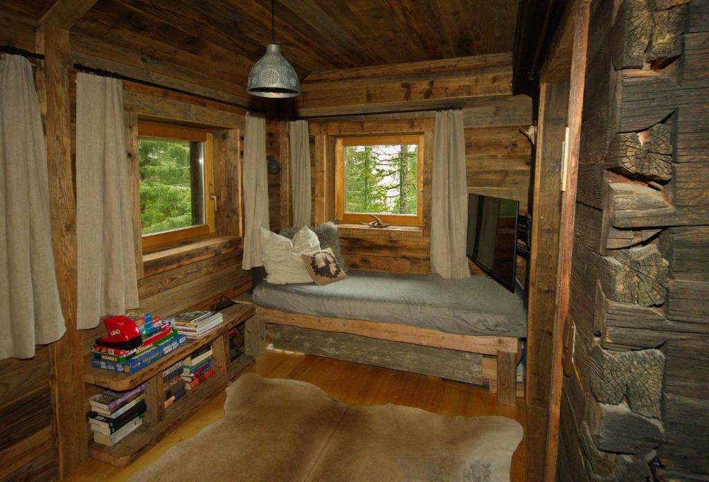 Postel nebo postele na pokoji v ubytování Falkert-Hütte „Beim Almöhi"