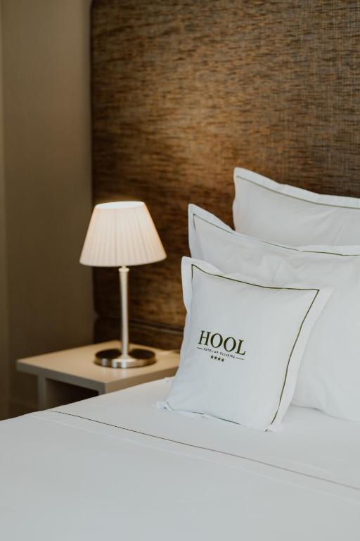 Postel nebo postele na pokoji v ubytování Hotel da Oliveira