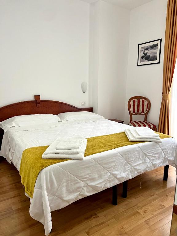 Postel nebo postele na pokoji v ubytování Hotel Joli