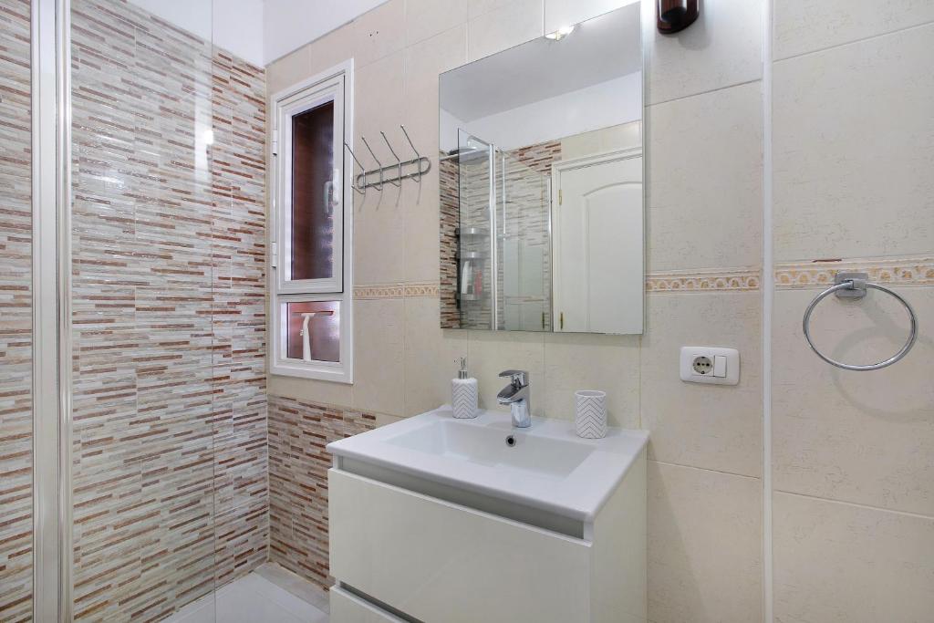 Koupelna v ubytování Beach Front Apartment Puertito