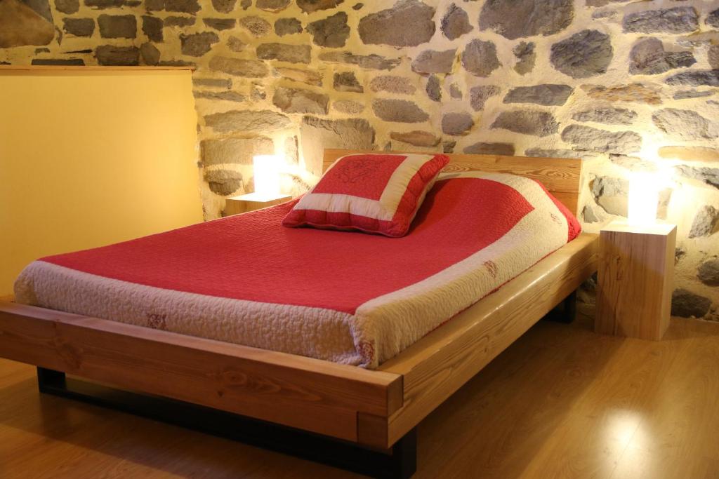 Postel nebo postele na pokoji v ubytování Gîte des Cabr'éoles