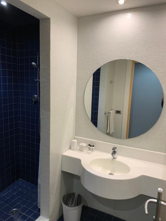 Koupelna v ubytování Hotel Abitart