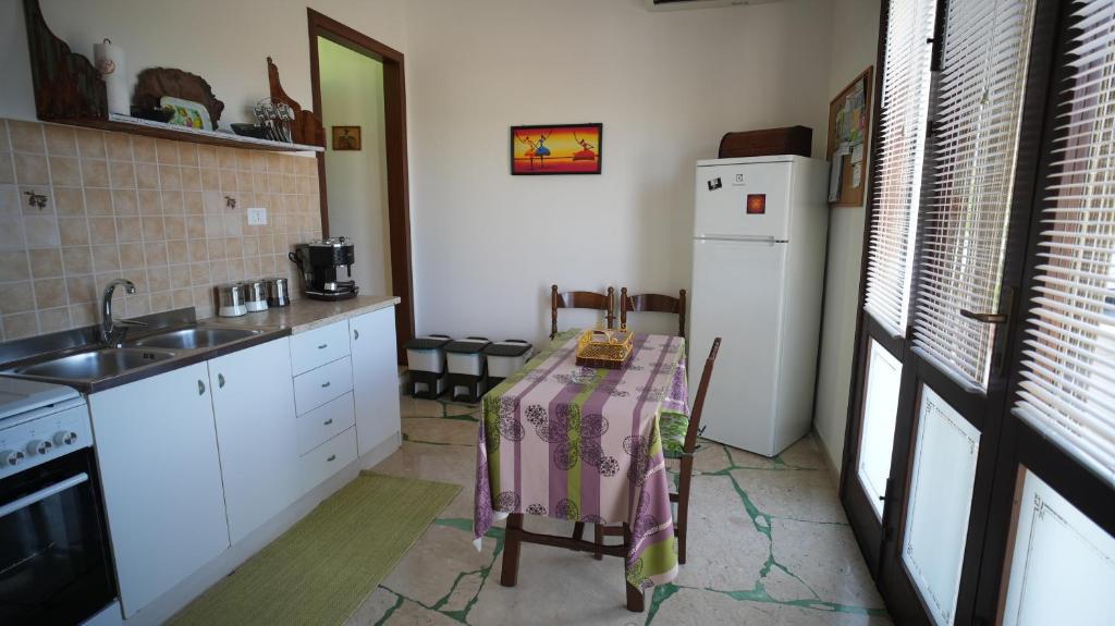 Kuchyňa alebo kuchynka v ubytovaní La Casa dei Fiori