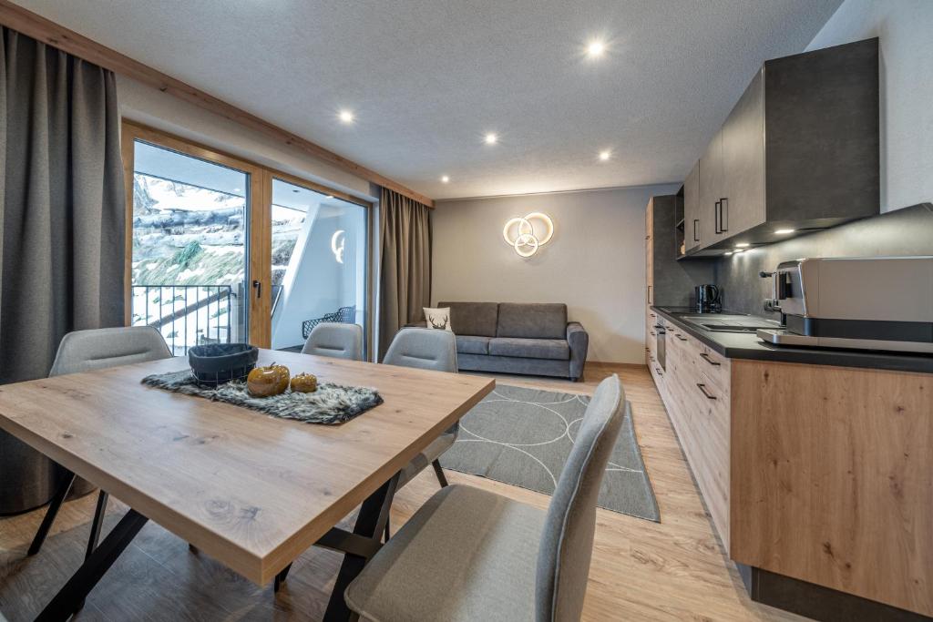 Kuchyňa alebo kuchynka v ubytovaní Bergmomente Apartments