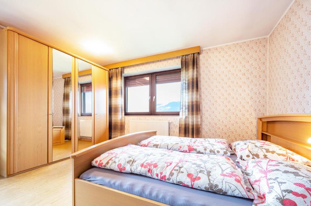 Postel nebo postele na pokoji v ubytování Ferienwohnung Gatscherhof