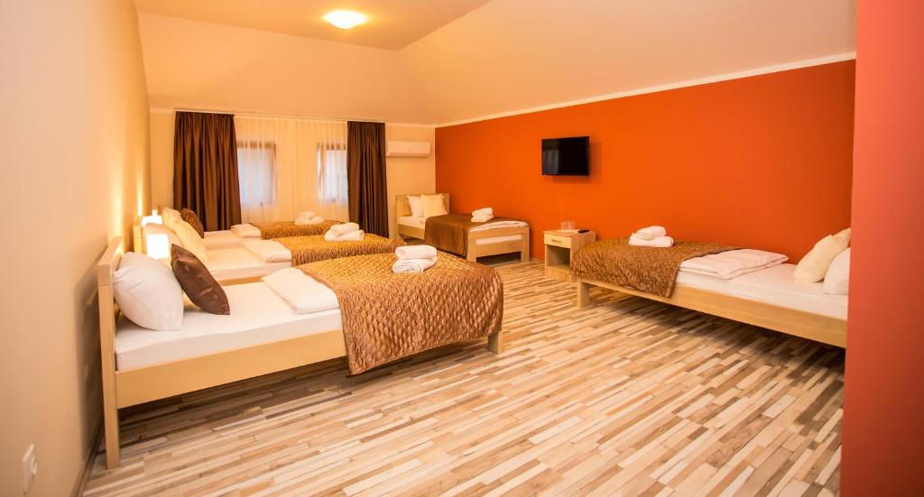 Postel nebo postele na pokoji v ubytování Hotel Hana