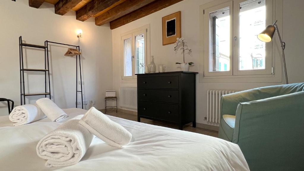 A bed or beds in a room at Residence Stella