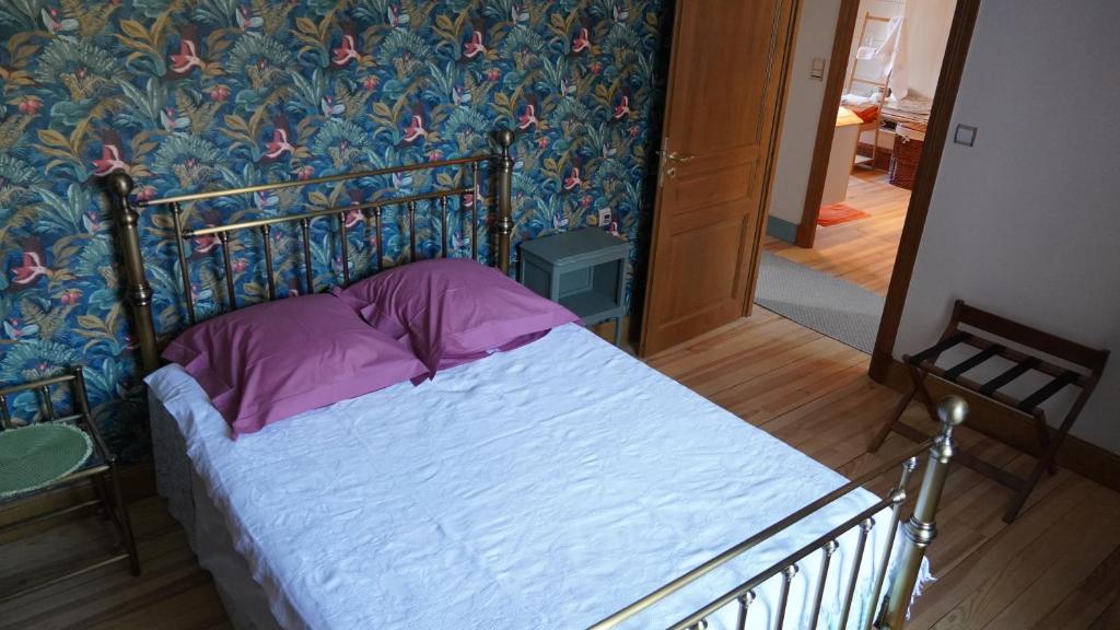 Postel nebo postele na pokoji v ubytování Au Coq Bleu