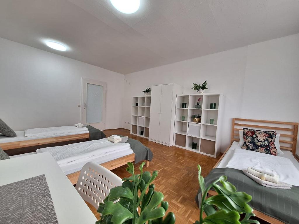 Ein Bett oder Betten in einem Zimmer der Unterkunft BrightCenterApartment